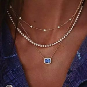 Gold Layered Necklace Set with Blue Gemstone Pendant